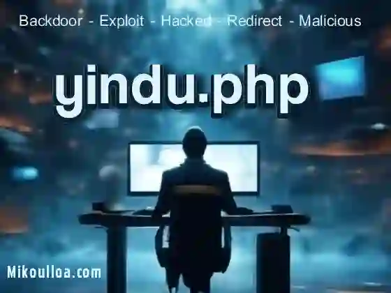 a man sitting in front of a computer screen watching the word yindu.php being display on it . 